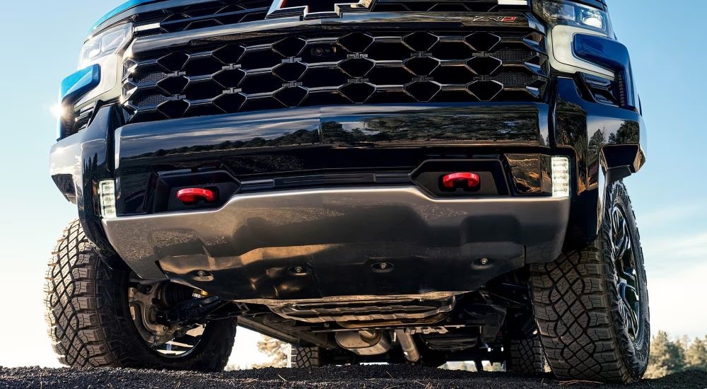 A close up shows the front bumper on a blue 2024 Chevy Silverado 1500 ZR2.