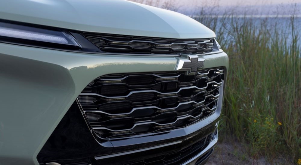 A close up shows the grille on a green2024 Chevy Trax Activ.
