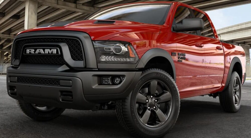 A red 2019 Ram 1500 Classic is shown parked in a city.