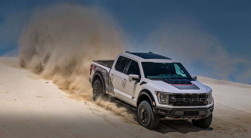 A grey 2023 Ford F-150 Raptor R is shown off-roading.