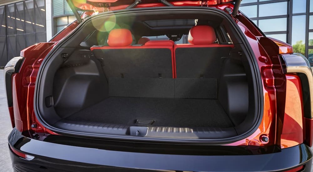 The black interior of a red 2024 Chevy Blazer is shown.