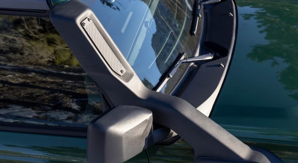 A snorkel system is shown installed on a green 2024 Ford Bronco Everglades.