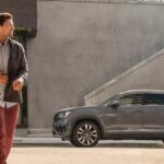 A gray 2023 Volkswagen Atlas Cross Sport is shown parked after viewing used SUVs.