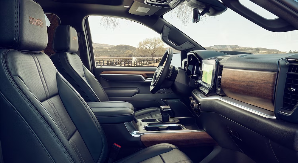 The black interior of a 2024 Chevy Silverado 1500 High Country is shown.