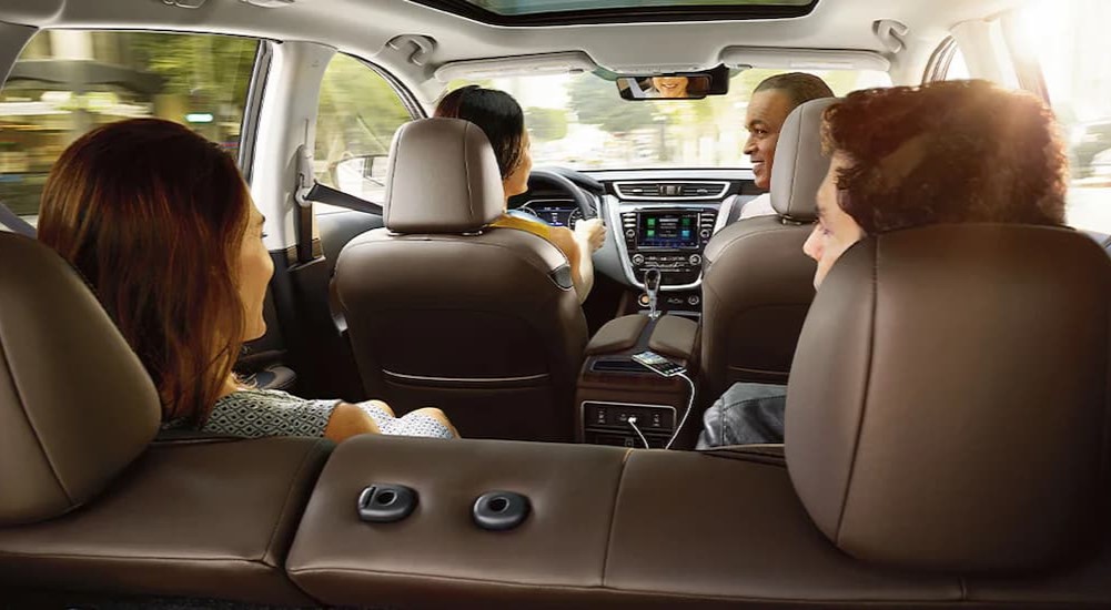 The brown and gray interior and dash of a 2024 Nissan Murano is shown.