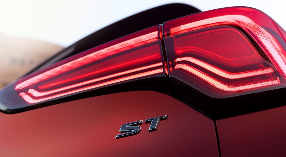 A close-up on the tailight of a 2024 Buick Encore GX ST is shown.