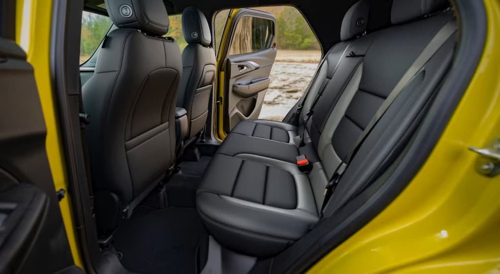 The black interior of a yellow 2024 Chevy Trailblazer is shown.