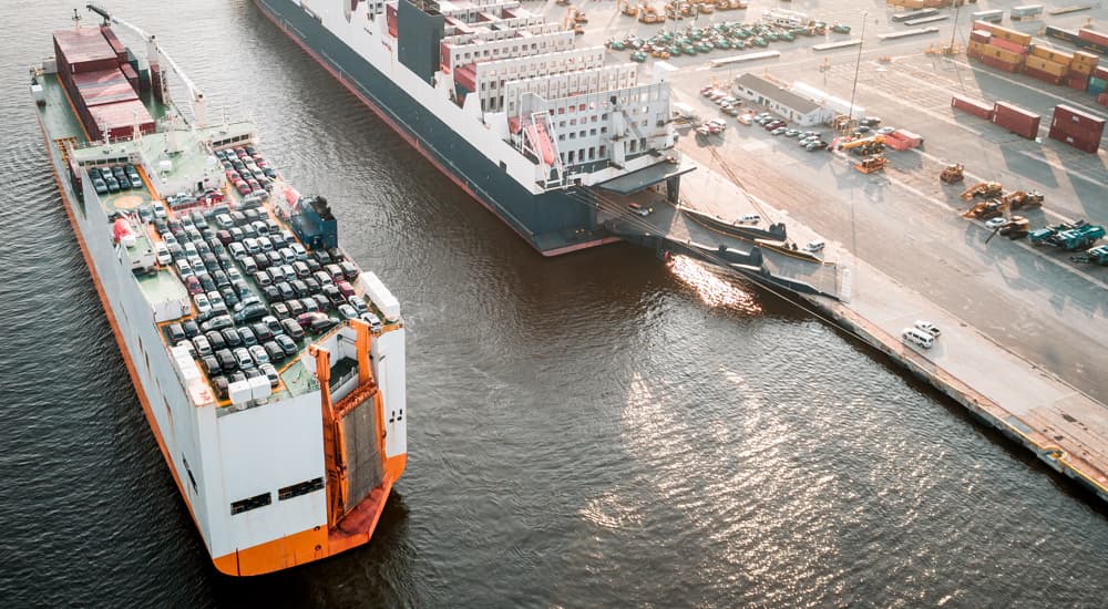 Aerial view of two roll-on/roll-off cargo ships docked at the Port of Baltimore.