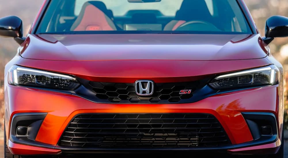 The front of a red 2024 Honda Civic Si. 