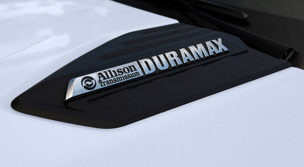 A close-up of the Allison Transmission badge on a white 2024 Chevy Silverado 3500 HD LTZ for sale.