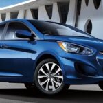 A blue 2017 Hyundai Accent, one of many used cars for sale.