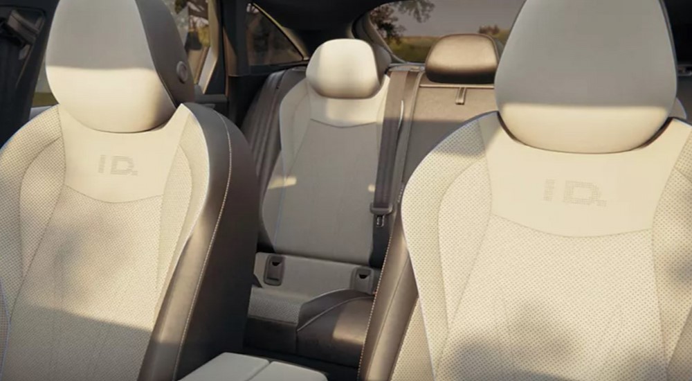 The white interior seating is shown in a 2025 Volkswagen ID.7.