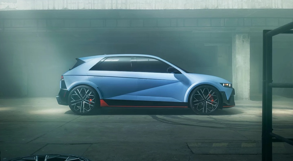 A blue 2025 Hyundai Ioniq N is shown from the side.