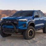 A blue 2023 Chevy Colorado ZR2 is shown from the front at an angle.