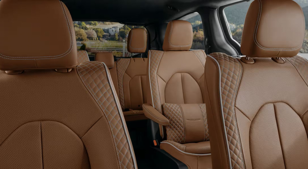 Brown leather seating in a 2025 Chrysler Pacifica Pinnacle at a Chrysler dealer.