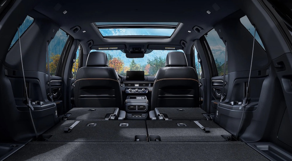 The black interior of a 2025 Honda Pilot.