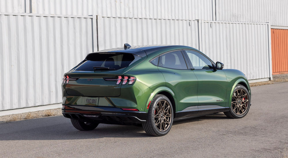 A green 2025 Ford Mustang Mach-E from the rear.
