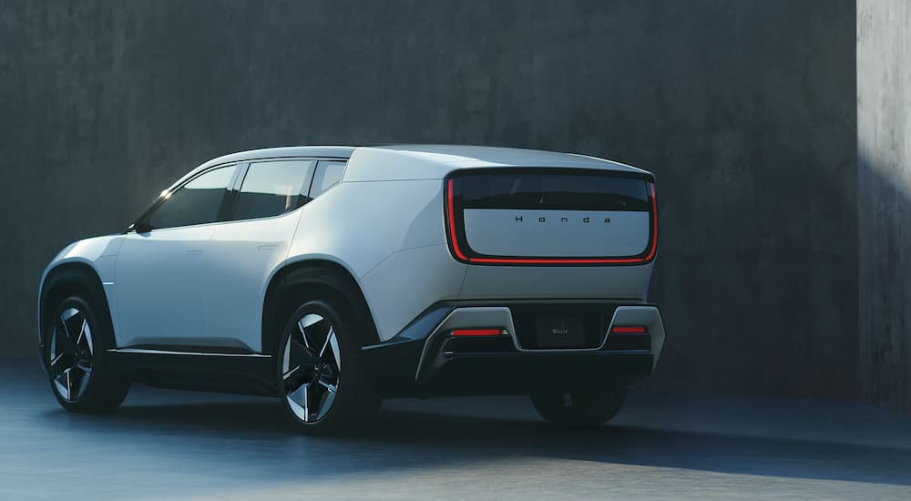 Rear of a white Honda 0 Series SUV.
