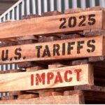 "2025 U.S. Tariffs Impact" written on pallets.