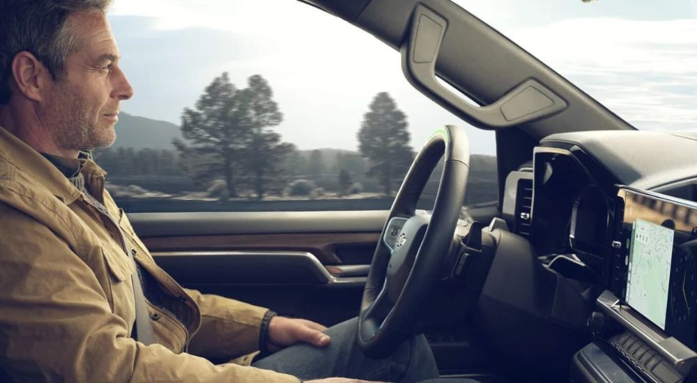 Man using Super Cruise while in a 2024 Chevy Silverado 1500.