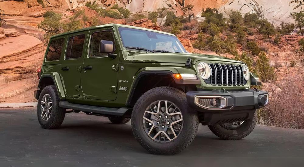 Green 2024 Wrangler Sahara Unlimited parked
