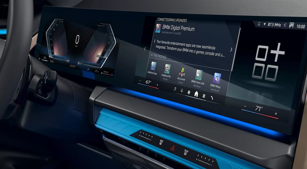 Infotainment and digital gauge cluster of a 2025 BMW X3 for sale