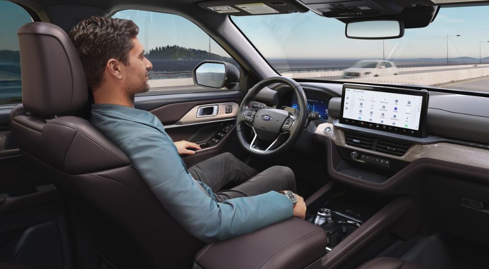 Man using BlueCruise while inside a 2025 Ford Explorer.