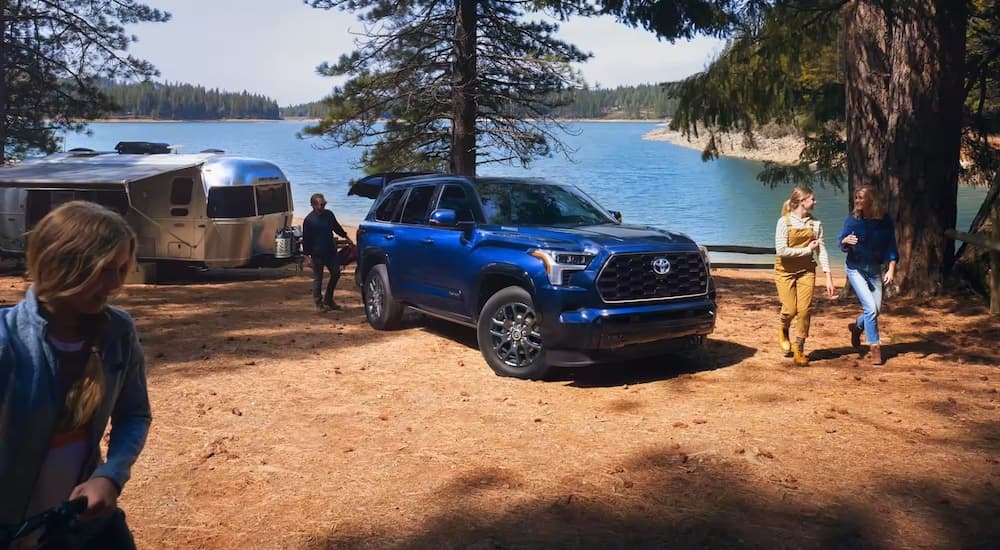 A blue 2023 Toyota Sequoia from the front at an angle after leaving a dealer that has a used Toyota for sale near Yonkers.