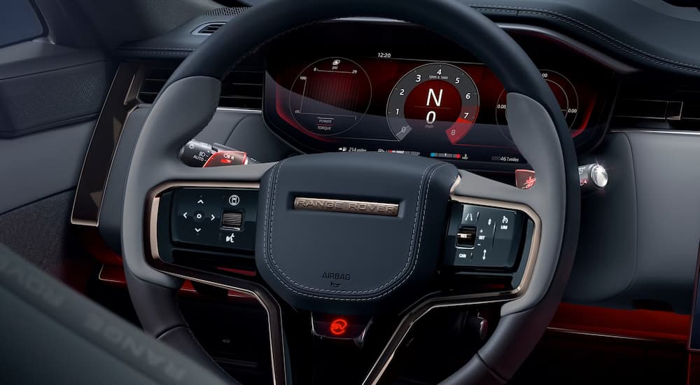 Steering wheel and digital gauge cluster of a 2025 Range Rover Sport