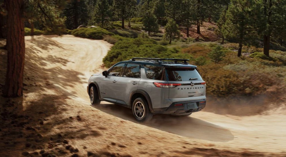 A gray 2025 Nissan Pathfinder Rock Creek off-roading.