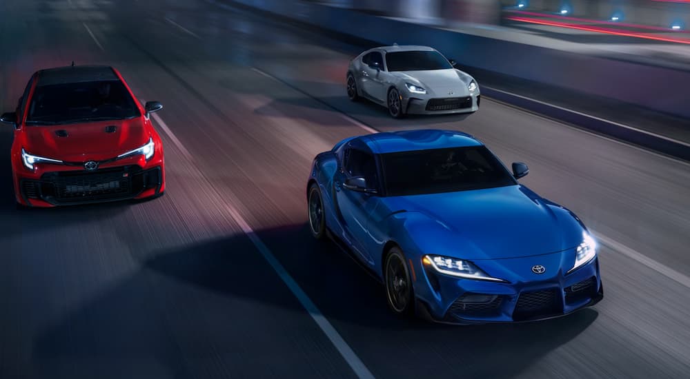 Three 2025 Toyota Gazoo Racing (GR) models driving down a highway