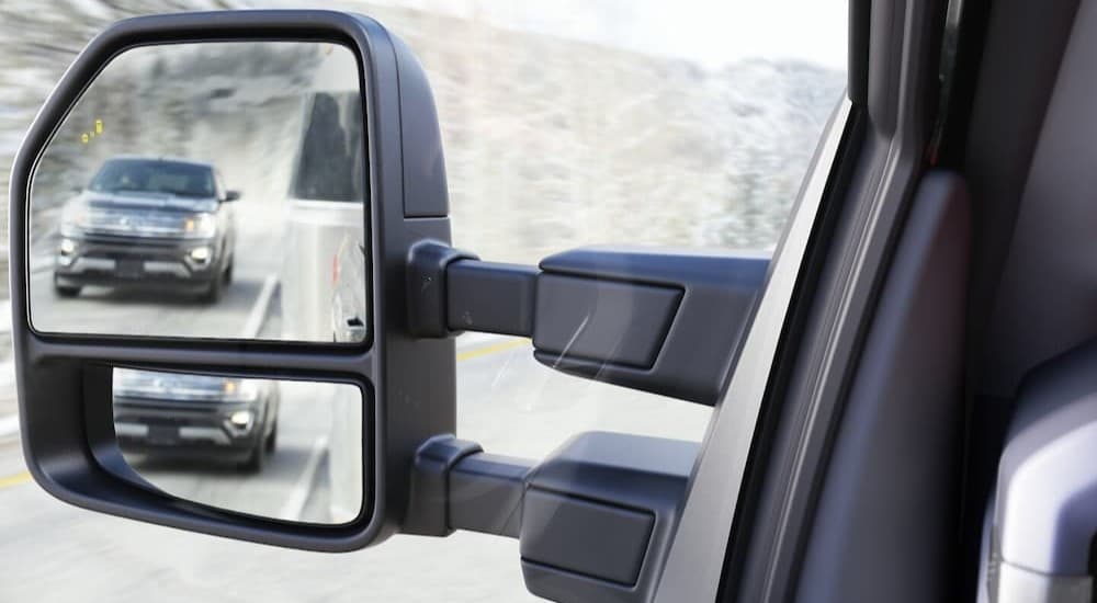 Close-up of the side mirrors in a 2023 Ford F-150.