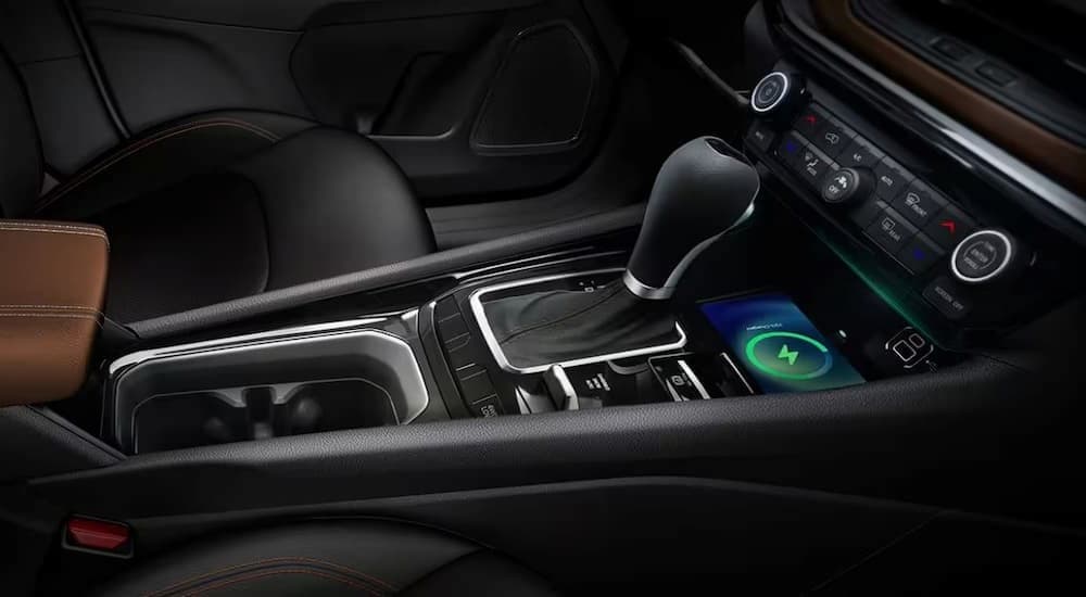 A close-up of the center console in a 2025 Jeep Compass.