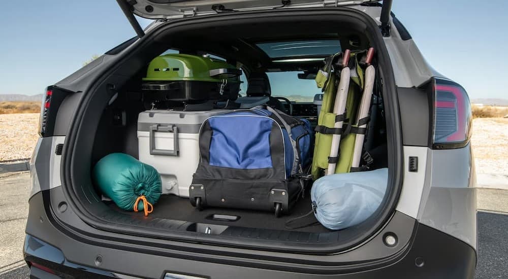 The cargo area in a silver 2026 Kia Sportage.