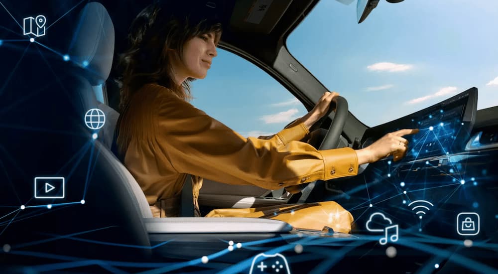 Woman driving in a 2025 BMW X7