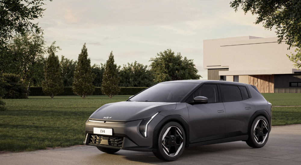 Grey 2026 Kia EV4 from the side at an angle.