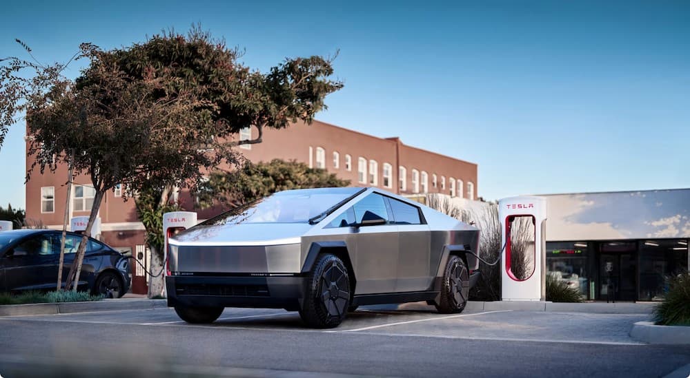 A silver 2025 parked and charging.
