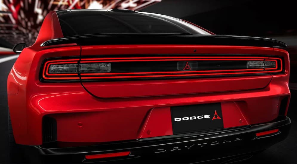 The rear-end of a red 2025 Dodge Charger Daytona.