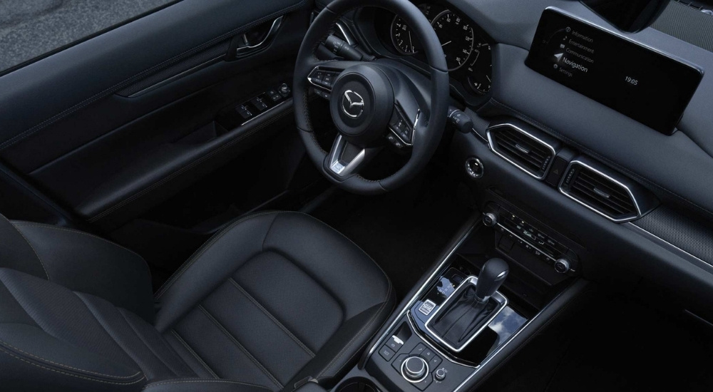 High view of the black interior of a 2026 Mazda CX-5.