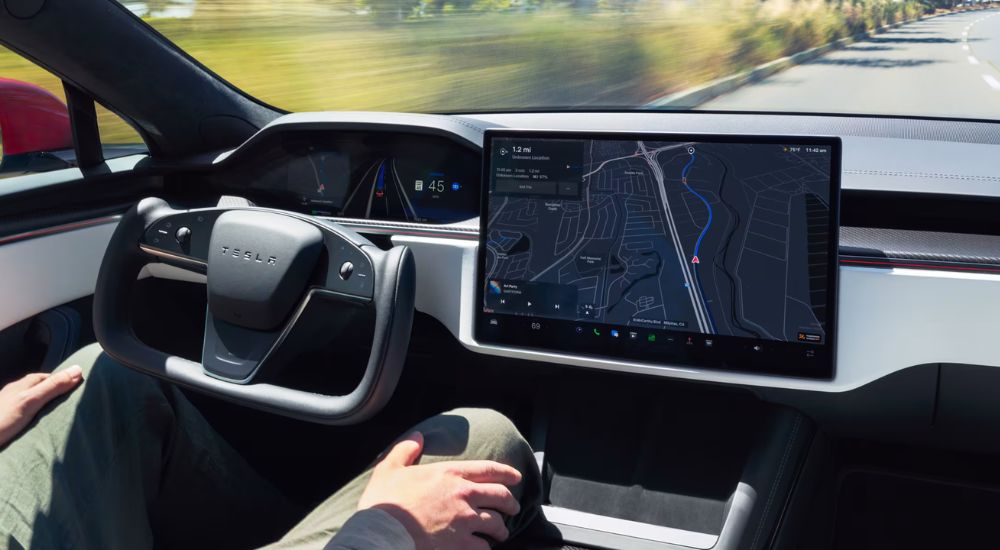 2026 Tesla Model S steering wheel and touch screen display