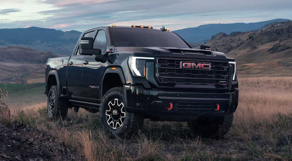 Black 2025 GMC Sierra 2500 HD AT4 parked off-road