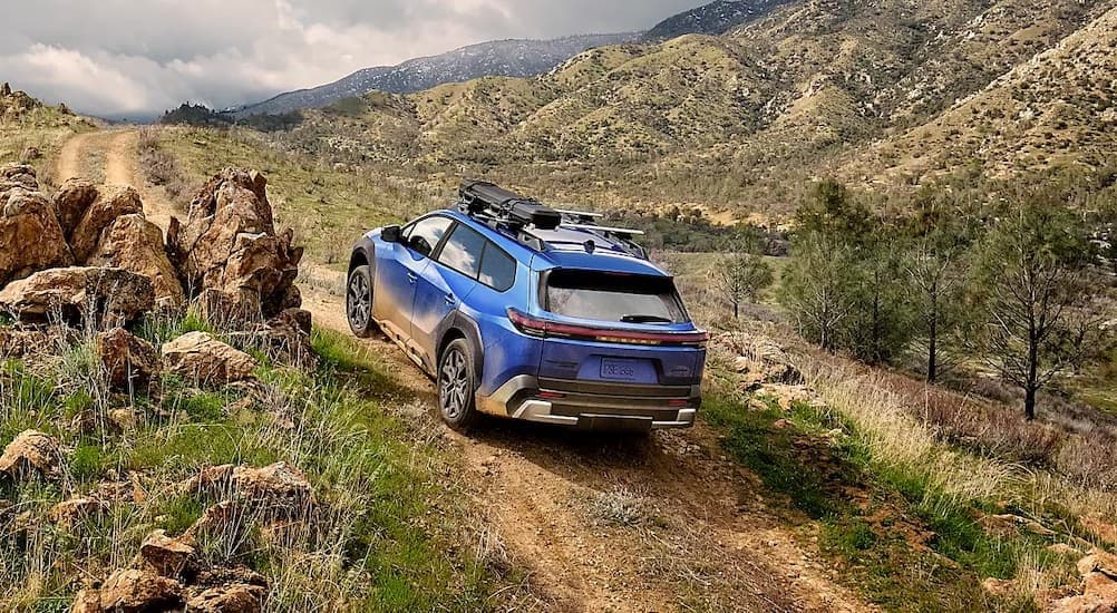 A blue 2026 Subaru Trailseeker off-roading.